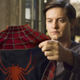 Tobey Maguire holding his costume in the original Spider-Man films.